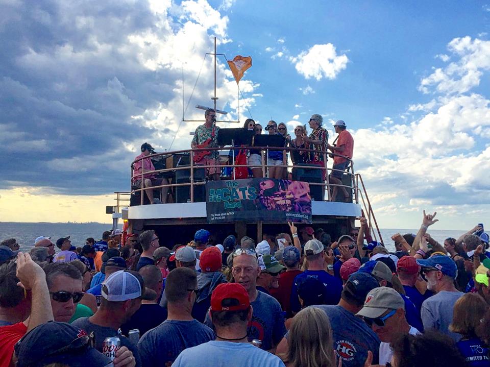 2016-08-07 - The Atlantic Ocean, somewhere between Provincetown and Boston. The MCats Band (www.mcatsband.org; feat. L-R Erik J. Heels, Eamon Tighe, Joshua Stein, Jon Oltsik , Paul Greenspan) rockin' the #PMC2016 party boat! Photo by Pan-Mass Challenge (www.pmc.org) rider for Team Lick Cancer Mark Wessel. Post-processing by Wendy Oltsik. We love you mans!