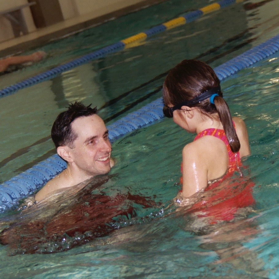 2005-03-22 Father and daughter swimming.